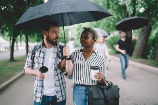 couple sharing an umbrella